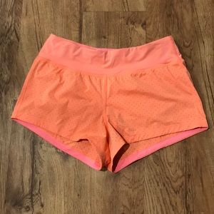 Size 6 Lululemon orange workout shorts